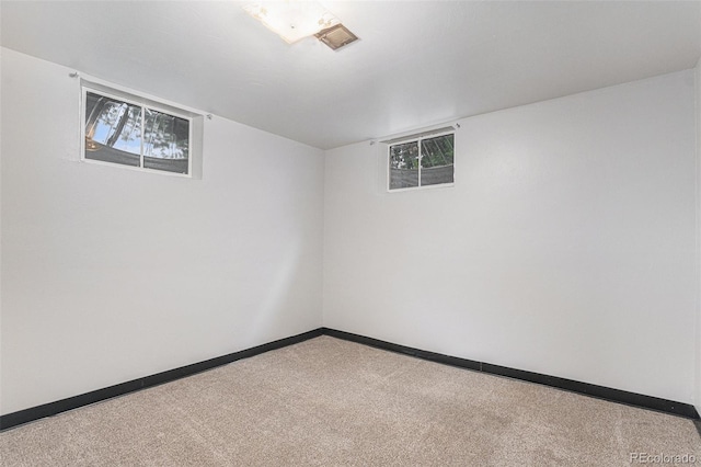 7644 Wyandot St, Denver, CO 80221 - empty room featuring carpet and baseboards