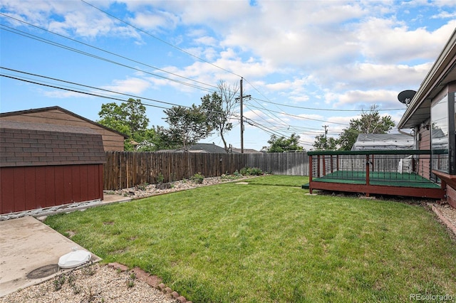 7644 Wyandot St, Denver, CO 80221 - fenced backyard featuring a shed and a deck