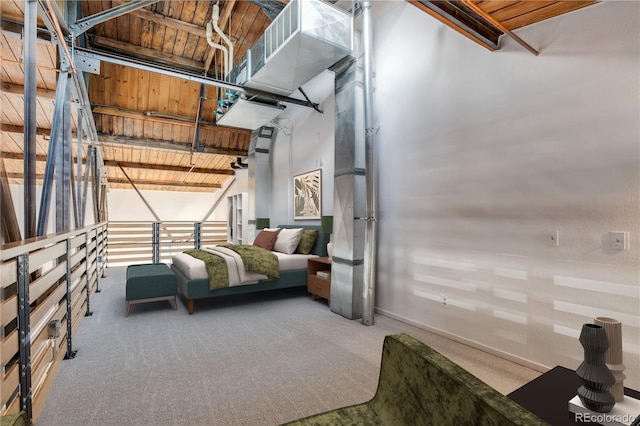 3033 Blake St Unit 121, Denver, CO 80205 - carpeted bedroom featuring baseboards and wood ceiling