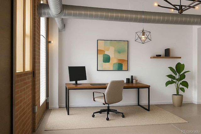 3033 Blake St Unit 121, Denver, CO 80205 - home office featuring baseboards