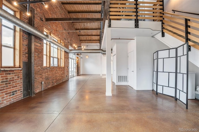 3033 Blake St Unit 121, Denver, CO 80205 - garage featuring wood ceiling and baseboards