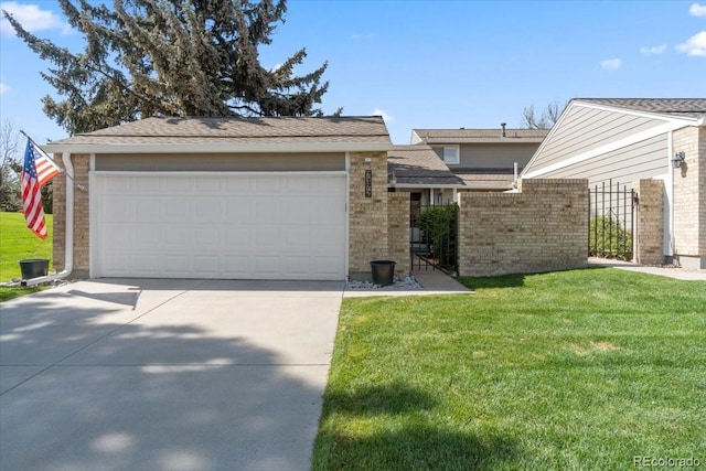7172 S Vine Cir, Centennial, CO 80122 - view of front of home with brick siding, driveway, and a garage