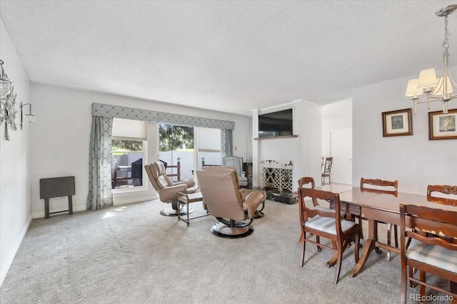 7172 S Vine Cir, Centennial, CO 80122 - dining area with a textured ceiling, a chandelier, and carpet flooring