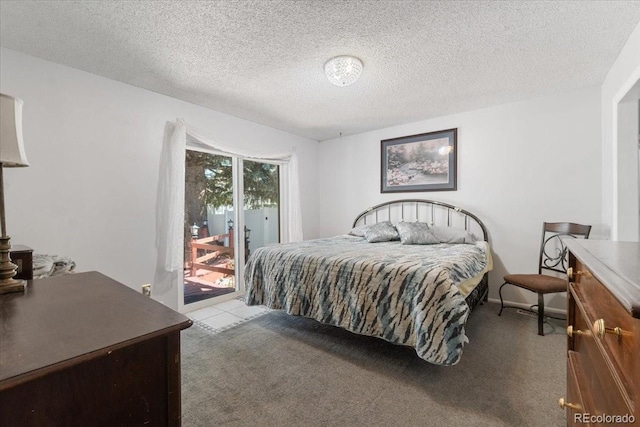 7172 S Vine Cir, Centennial, CO 80122 - bedroom with access to outside, carpet floors, and a textured ceiling