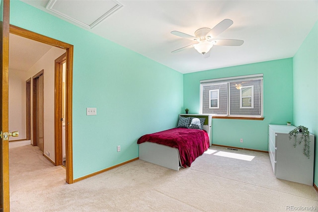 9346 Lark Sparrow Dr, Highlands Ranch, CO 80126 - carpeted bedroom with baseboards, a ceiling fan, and attic access