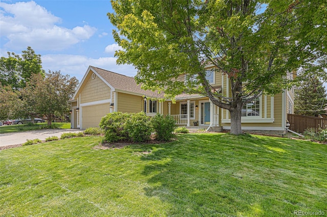 9346 Lark Sparrow Dr, Highlands Ranch, CO 80126 - view of front facade with covered porch, a garage, and driveway