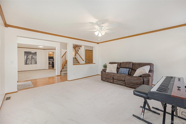 9346 Lark Sparrow Dr, Highlands Ranch, CO 80126 - carpeted living area featuring ceiling fan, baseboards, ornamental molding, and stairway