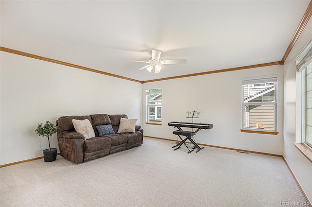 9346 Lark Sparrow Dr, Highlands Ranch, CO 80126 - living room with light colored carpet, ceiling fan, baseboards, healthy amount of natural light, and crown molding