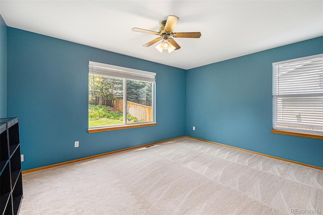 9346 Lark Sparrow Dr, Highlands Ranch, CO 80126 - carpeted spare room with ceiling fan and baseboards