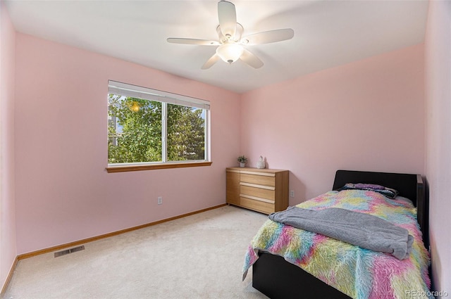 9346 Lark Sparrow Dr, Highlands Ranch, CO 80126 - bedroom with light colored carpet, baseboards, and ceiling fan
