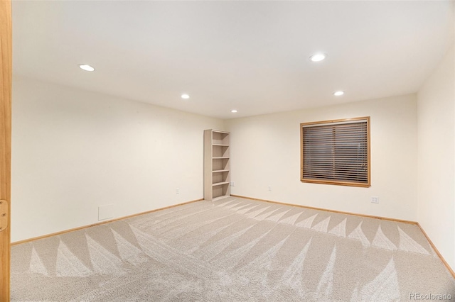 9346 Lark Sparrow Dr, Highlands Ranch, CO 80126 - empty room with recessed lighting, light carpet, and baseboards