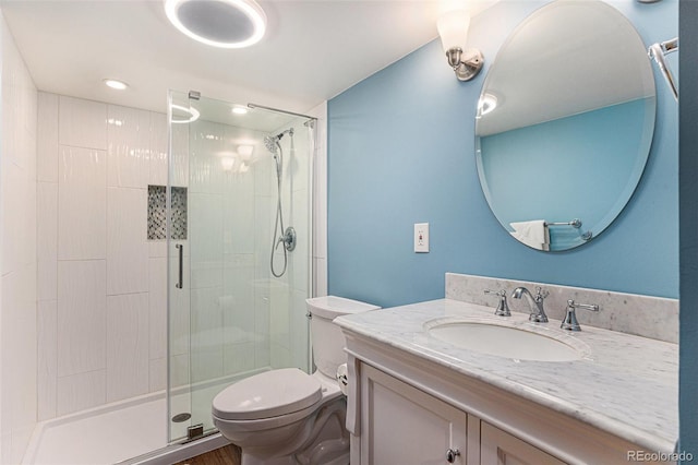 9346 Lark Sparrow Dr, Highlands Ranch, CO 80126 - full bathroom featuring a shower stall, toilet, and vanity