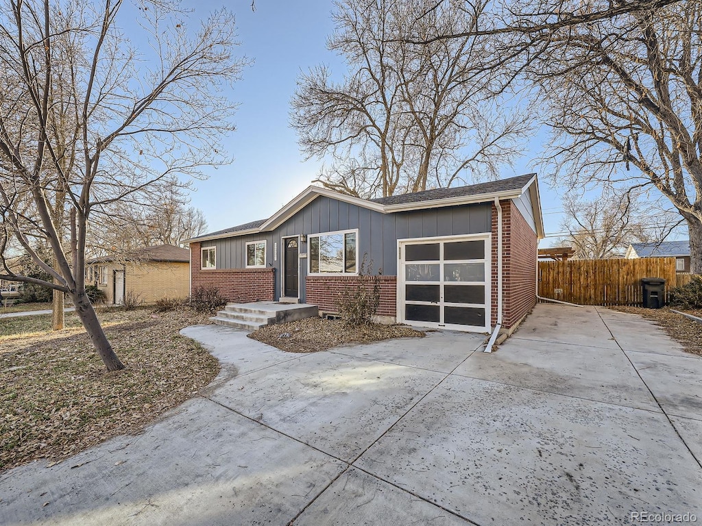 ranch-style home featuring a garage