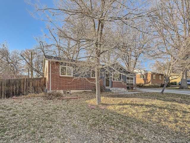 view of front of home with a front yard