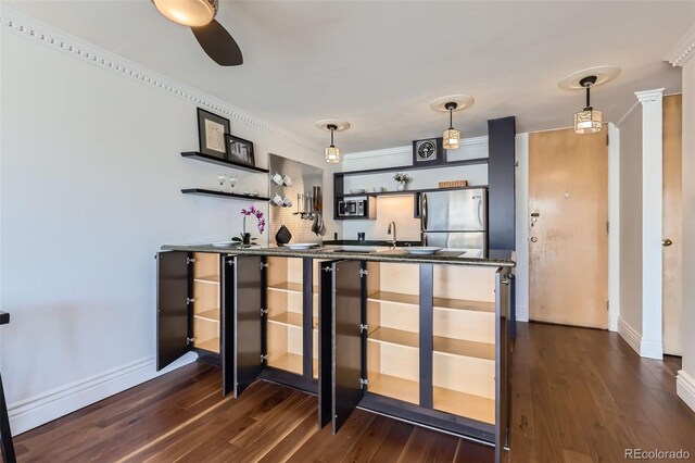 1050 N Corona St Unit 308, Denver, CO 80218 - kitchen featuring open shelves, freestanding refrigerator, dark wood-style flooring, baseboards, and crown molding