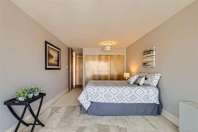 1050 N Corona St Unit 308, Denver, CO 80218 - bedroom with light carpet and baseboards