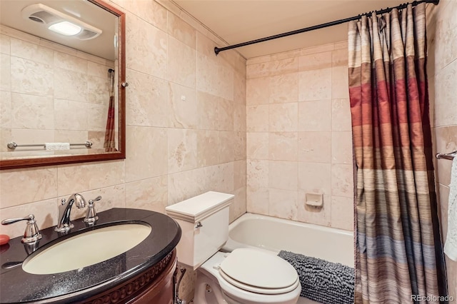 1050 N Corona St Unit 308, Denver, CO 80218 - full bath featuring tile walls, shower / bath combo, toilet, and vanity