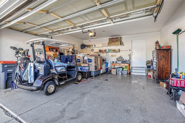 garage featuring a garage door opener