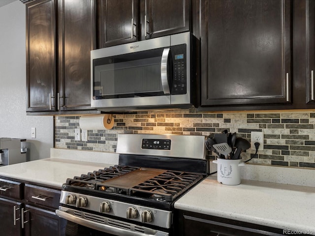 6832 Sequoia St, Frederick, CO 80530 - kitchen with stainless steel appliances, decorative backsplash, light countertops, and dark brown cabinetry