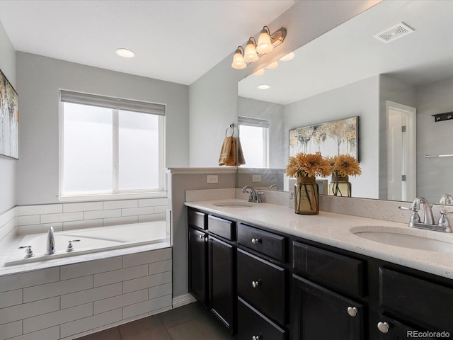 6832 Sequoia St, Frederick, CO 80530 - full bath with double vanity, a bath, and tile patterned flooring