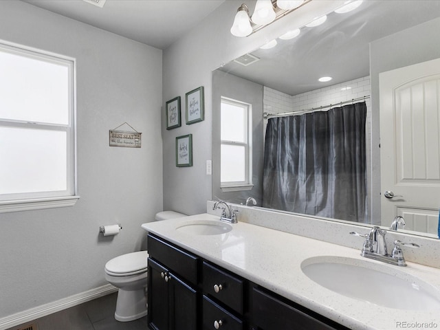 6832 Sequoia St, Frederick, CO 80530 - bathroom with plenty of natural light, double vanity, tile patterned flooring, and a shower with curtain