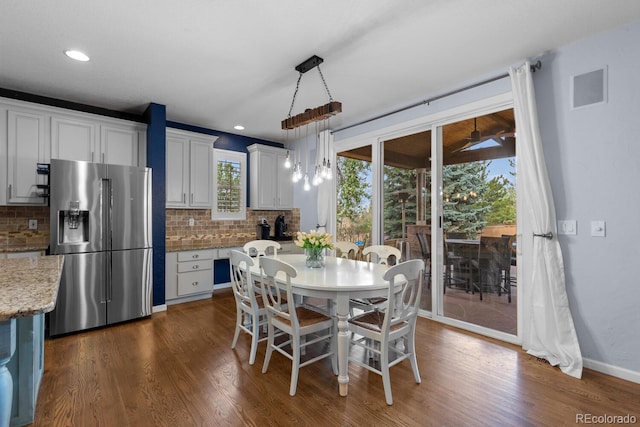 dining space featuring recessed lighting, baseboards, dark wood finished floors, and visible vents