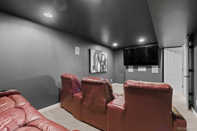 cinema room featuring baseboards, recessed lighting, and carpet floors