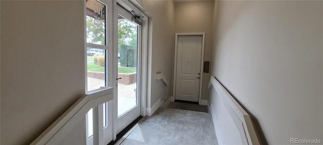 entryway featuring concrete floors