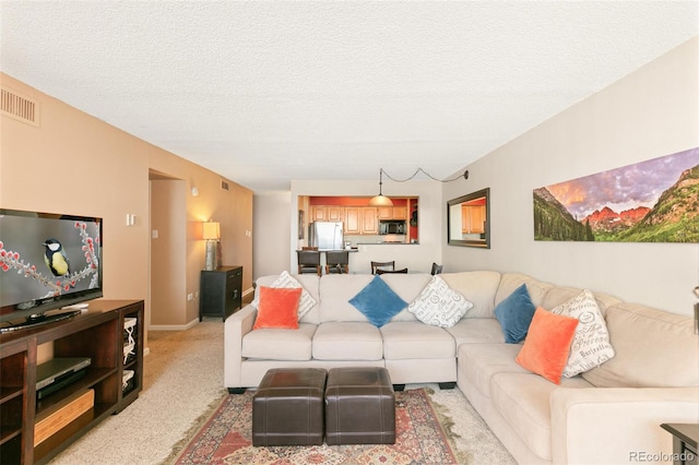 1020 15th St Unit 16A, Denver, CO 80202 - living room featuring light colored carpet and a textured ceiling