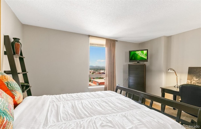 1020 15th St Unit 16A, Denver, CO 80202 - bedroom featuring a textured ceiling