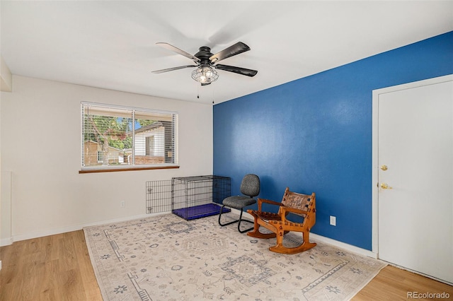 6898 S Franklin Cir, Centennial, CO 80122 - living area featuring wood finished floors and ceiling fan