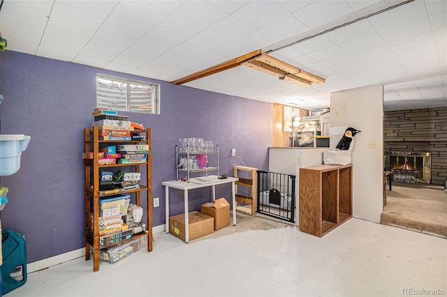 6898 S Franklin Cir, Centennial, CO 80122 - basement featuring a stone fireplace