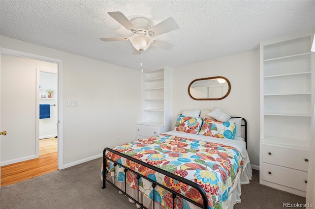 2315 N Murray Blvd, Colorado Springs, CO 80915 - carpeted bedroom with a textured ceiling and ceiling fan