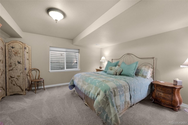 bedroom with light colored carpet