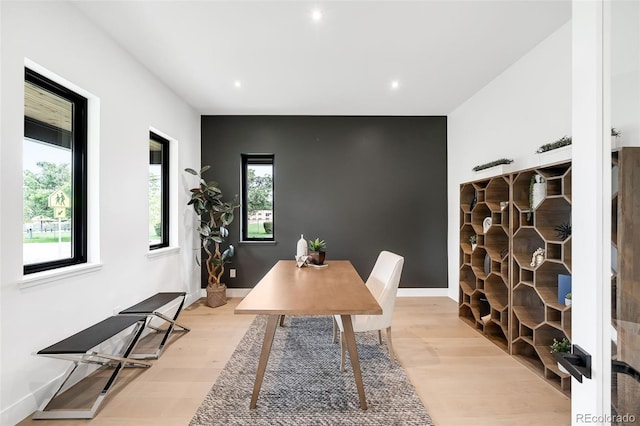 office with light wood-type flooring