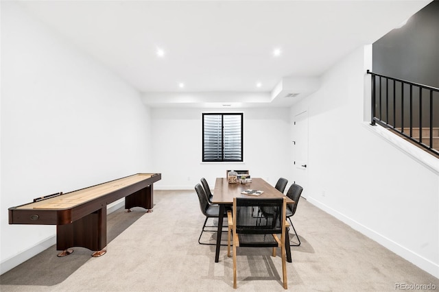 view of carpeted dining area