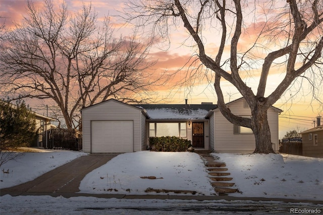 view of front of home with a garage