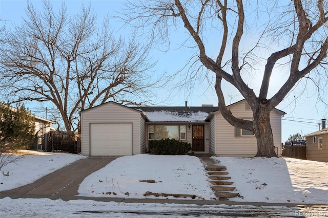 view of front of property featuring a garage