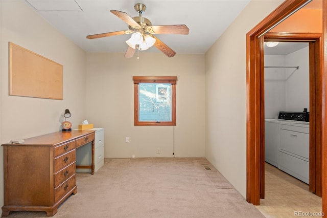 bedroom with ceiling fan, light colored carpet, a spacious closet, and a closet