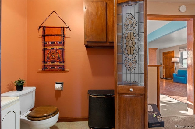 bathroom with vanity and toilet