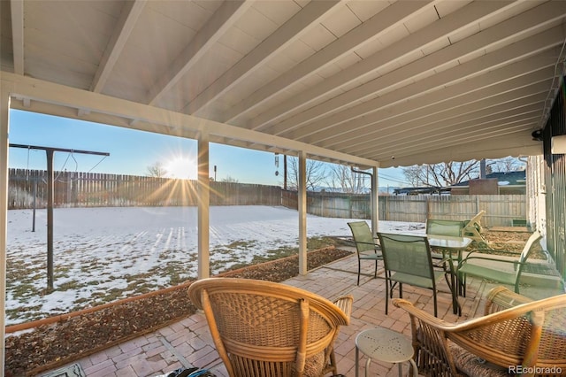 view of snow covered patio