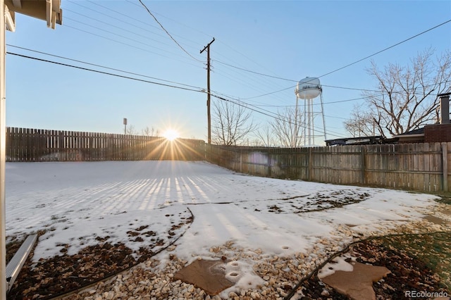 view of yard covered in snow