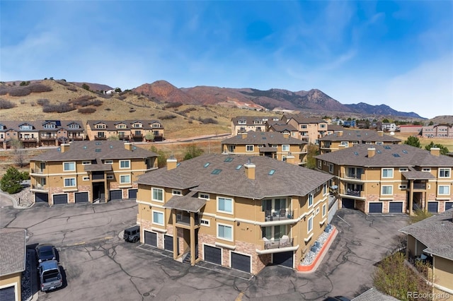 1816 Montura Vw Unit 204, Colorado Springs, CO 80919 - drone / aerial view featuring a mountain view and a residential view