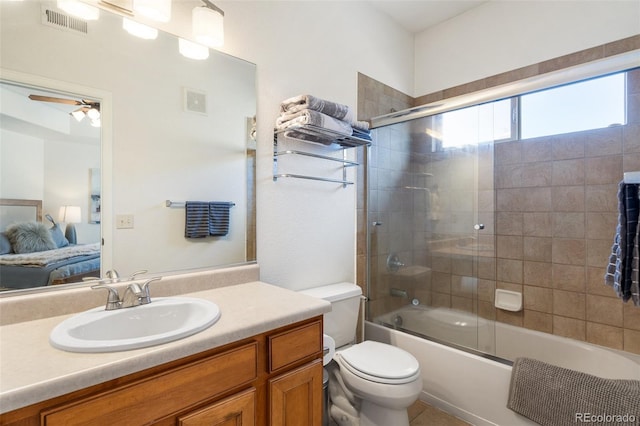 1816 Montura Vw Unit 204, Colorado Springs, CO 80919 - ensuite bathroom featuring visible vents, toilet, a ceiling fan, ensuite bath, and vanity
