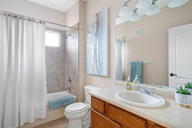 1816 Montura Vw Unit 204, Colorado Springs, CO 80919 - full bath featuring vanity, tile patterned flooring, visible vents, toilet, and shower / bath combo with shower curtain