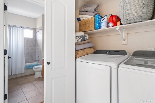 1816 Montura Vw Unit 204, Colorado Springs, CO 80919 - laundry room with light tile patterned floors, separate washer and dryer, and laundry area