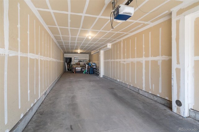 1816 Montura Vw Unit 204, Colorado Springs, CO 80919 - garage featuring a garage door opener