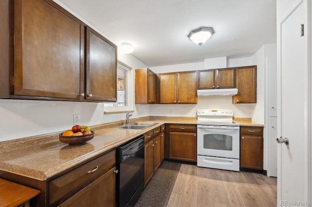 kitchen featuring white electric range, under cabinet range hood, a sink, black dishwasher, and light wood finished floors