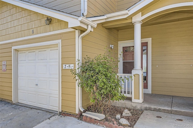 3200 S Federal Blvd Unit 5, Denver, CO 80236 - entrance to property with a porch and a garage