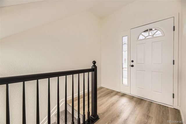 3200 S Federal Blvd Unit 5, Denver, CO 80236 - entryway featuring wood finished floors and lofted ceiling